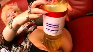 Granny Masturbates With Everything
